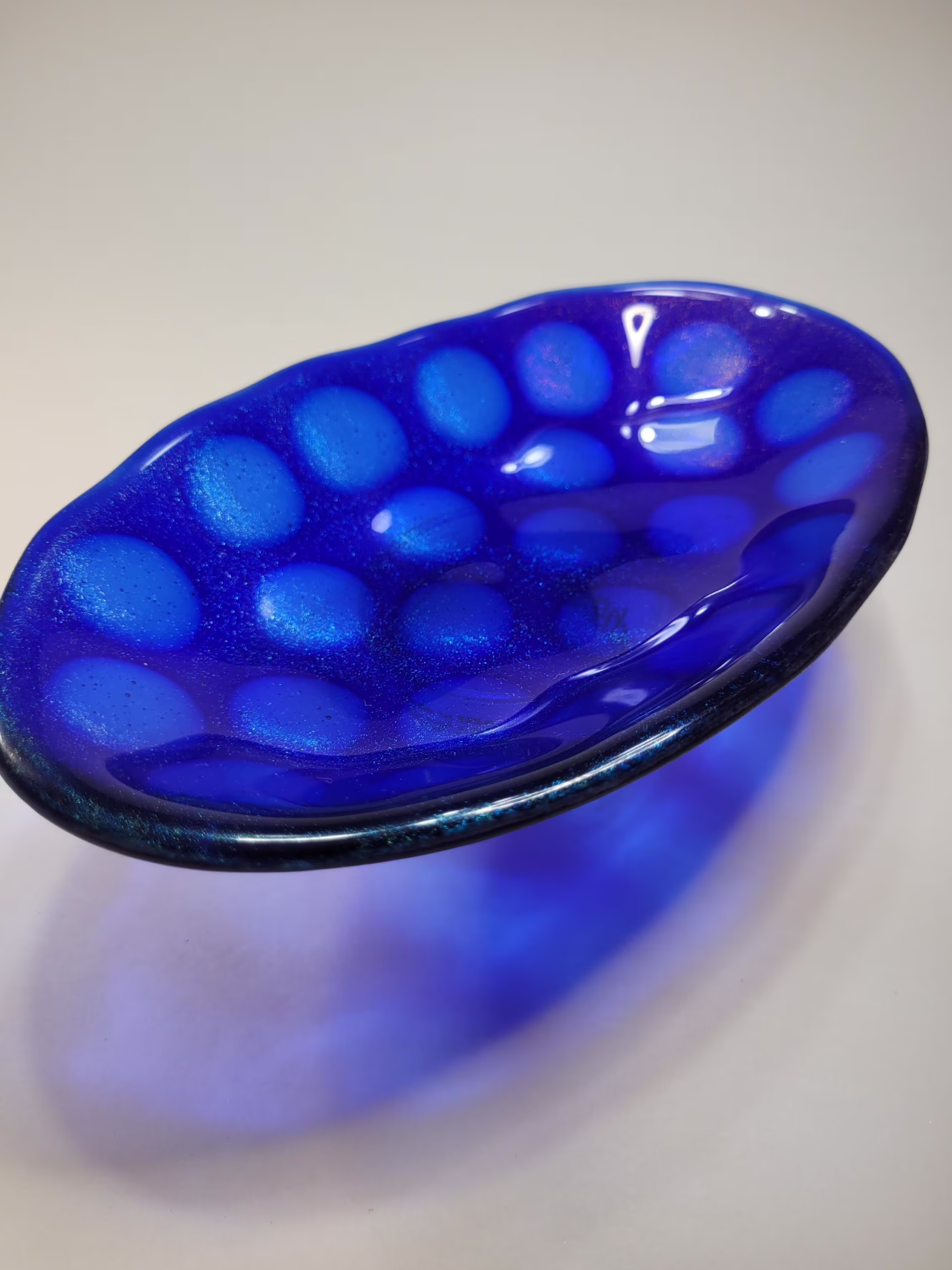 fused glass bowl, blue iridescent. fused glass bowl, blue iridescent.