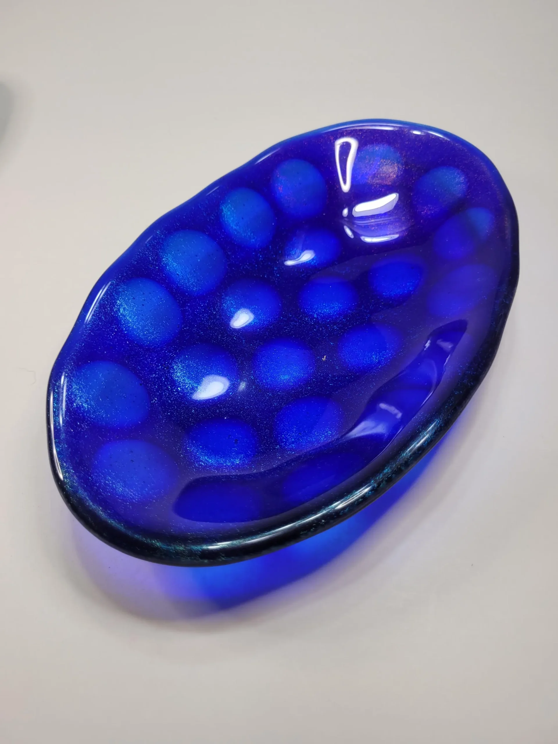 fused glass bowl, blue iridescent. fused glass bowl, blue iridescent.