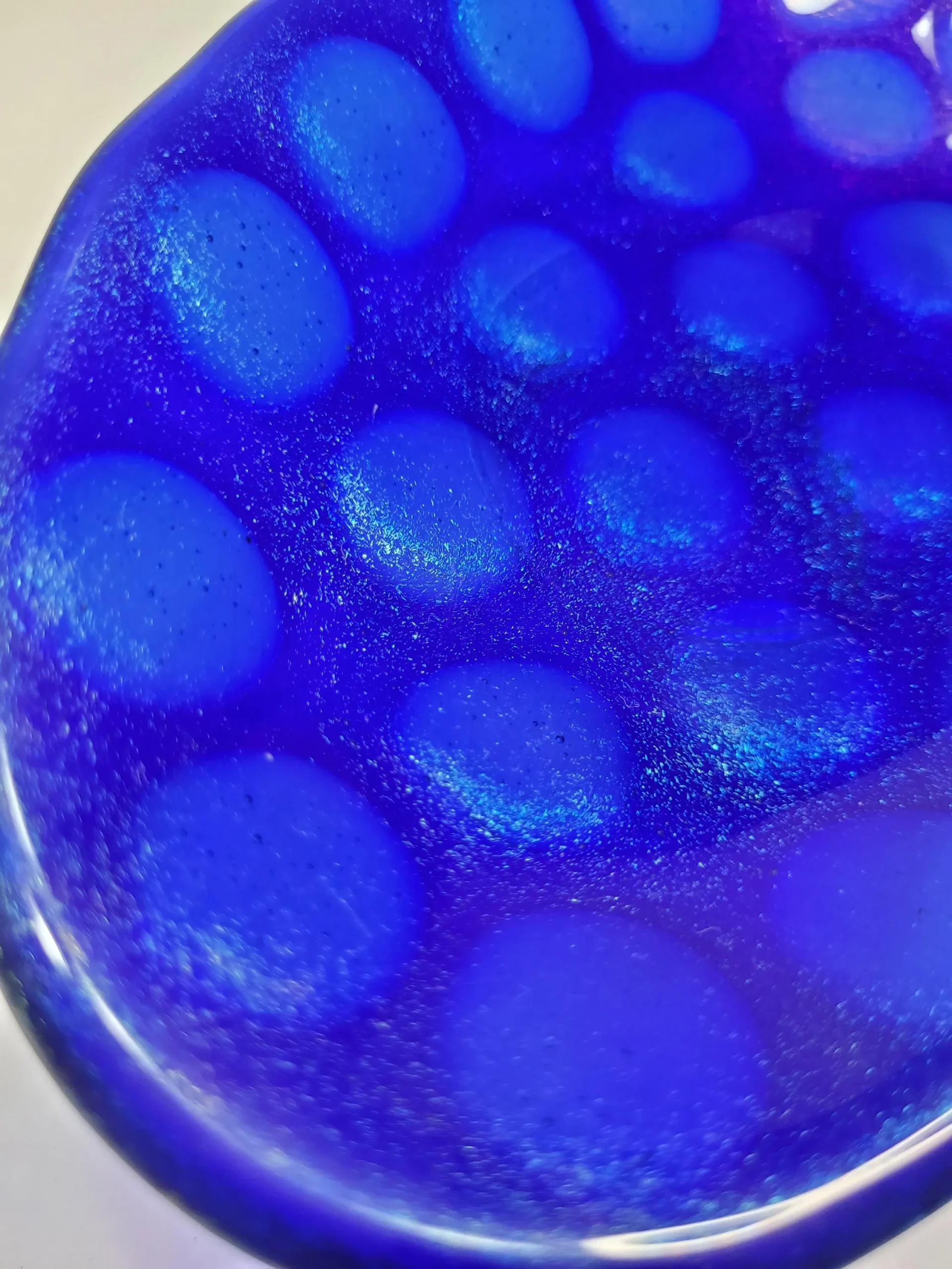 fused glass bowl, blue iridescent. fused glass bowl, blue iridescent.