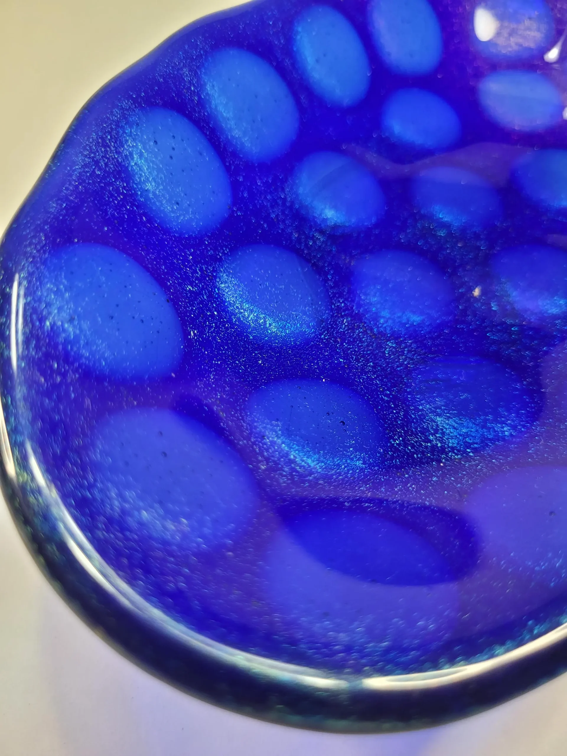 fused glass bowl, blue iridescent. fused glass bowl, blue iridescent.